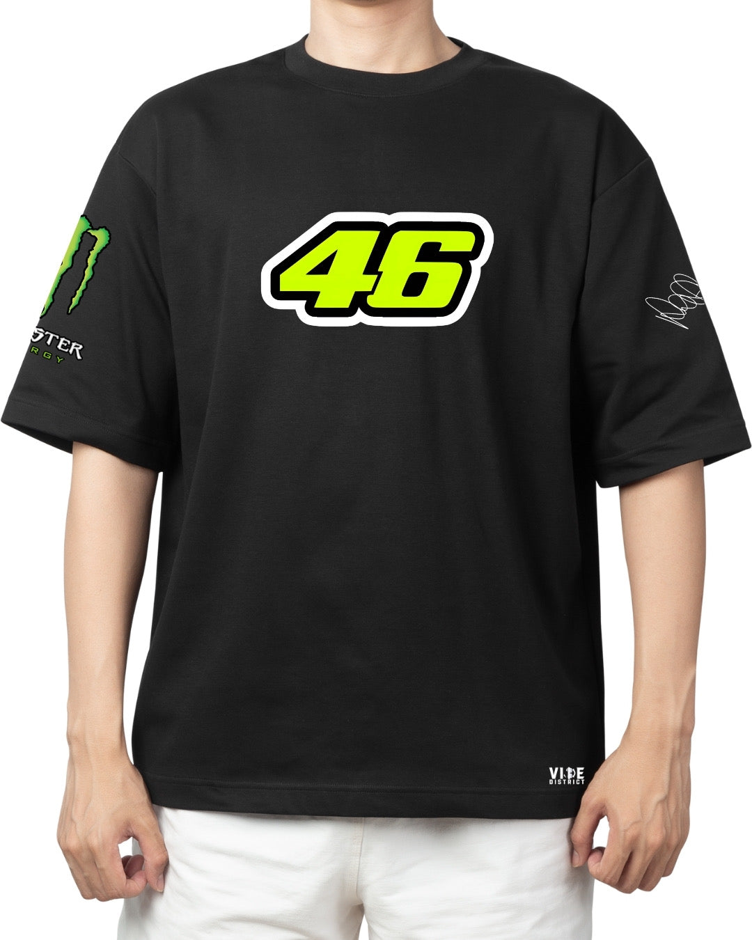 Front view of black oversized t-shirt with neon yellow number 46 and Monster Energy logo on sleeve.